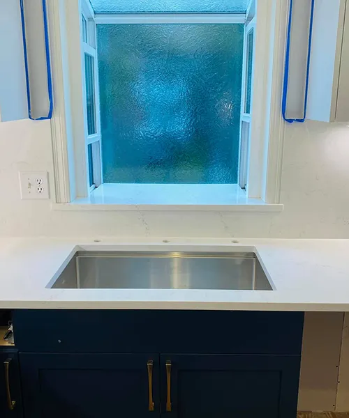 Countertops with full high backsplashes and one waterfall leg in Mukilteo 